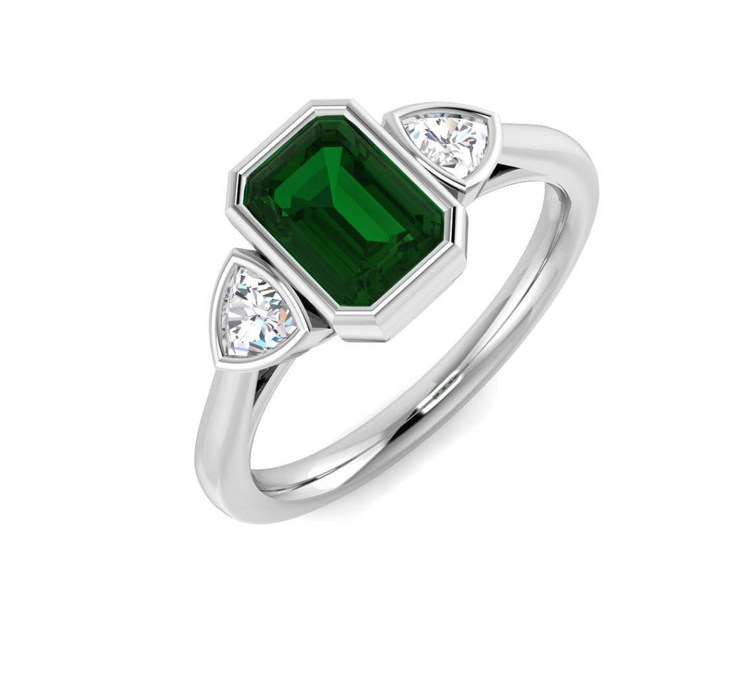 Platinum Emerald and Diamond Three Stone Ring